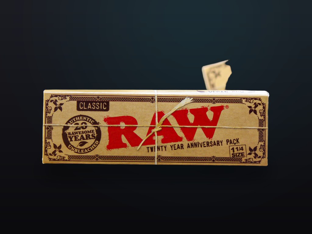 Cigarillos, rolling papers and a grinder